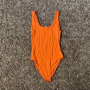 Orange bodysuit